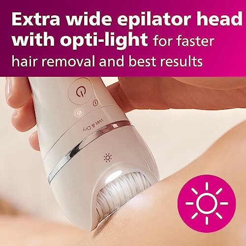 Epilator with extra wide head and opti-light for efficient hair removal.