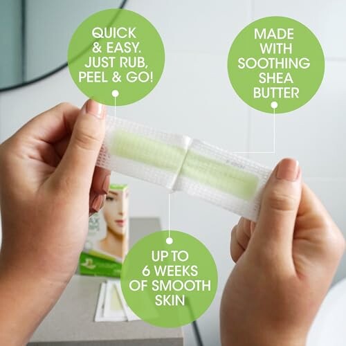 Hands holding hair removal wax strip with product benefits.