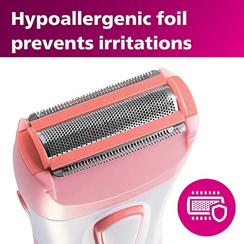 Close-up of hypoallergenic foil electric shaver with pink accents.