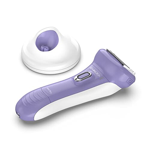 Purple and white electric razor with charging stand